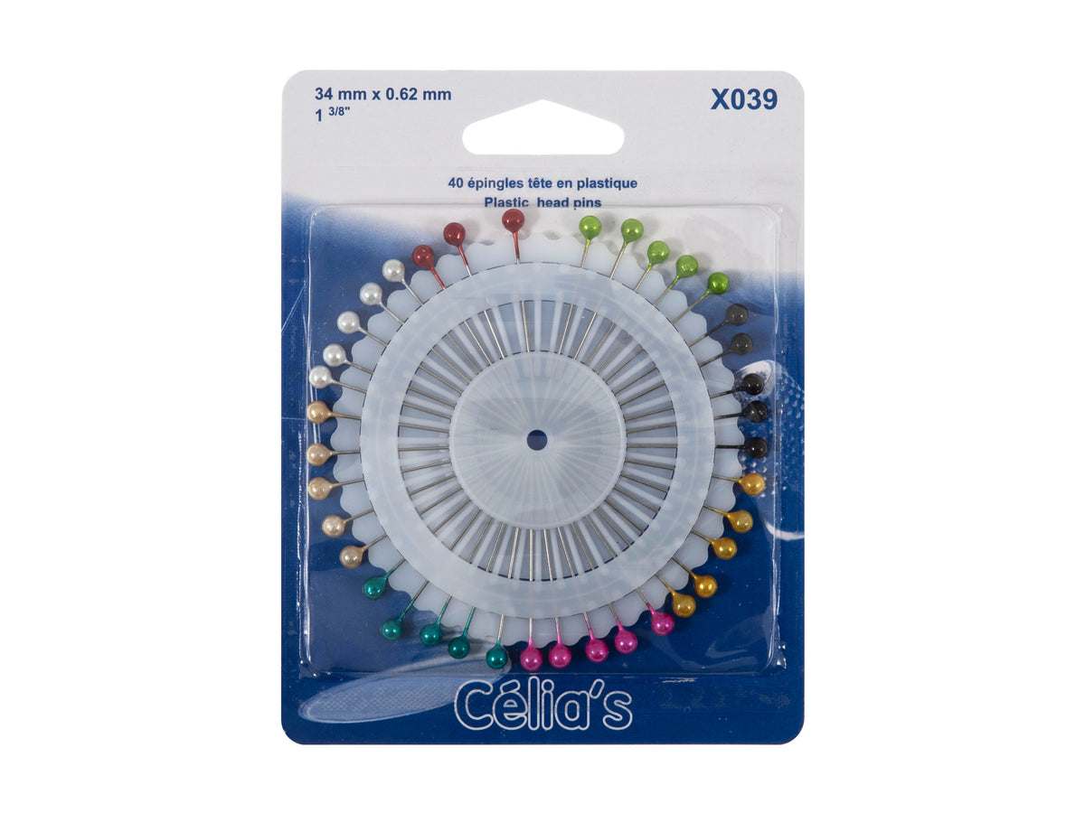 Celia's plastic head pearl dress pins, 34mm x 0.62mm, with white pearl heads arranged on a pin wheel for sewing and craft projects.