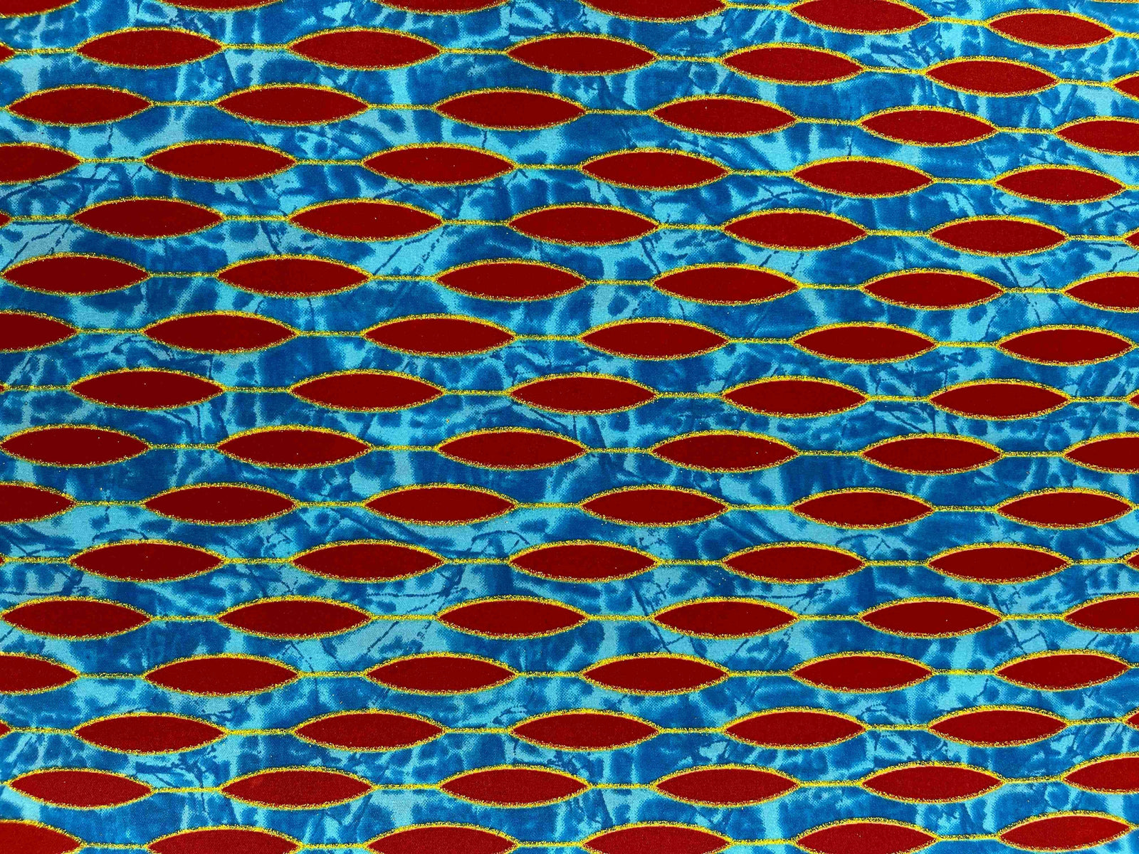 Bright African Wax Print fabric with bold geometric patterns in vibrant colors, showcasing Design 7 from Cheapfabrics.