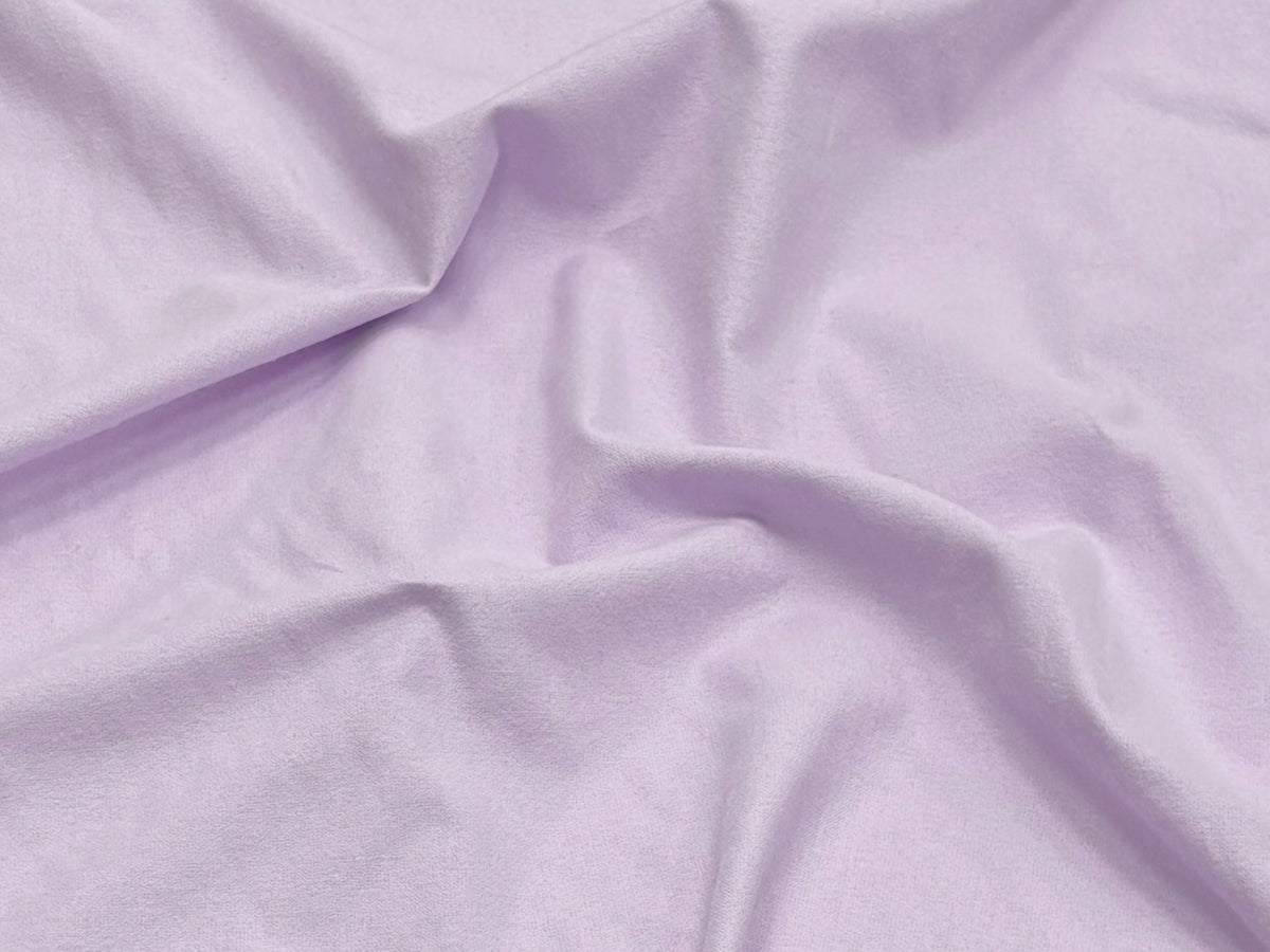 Light purple Wynciette brushed cotton fabric from Cheap Fabrics, showing a soft, textured textile with a smooth, brushed surface.