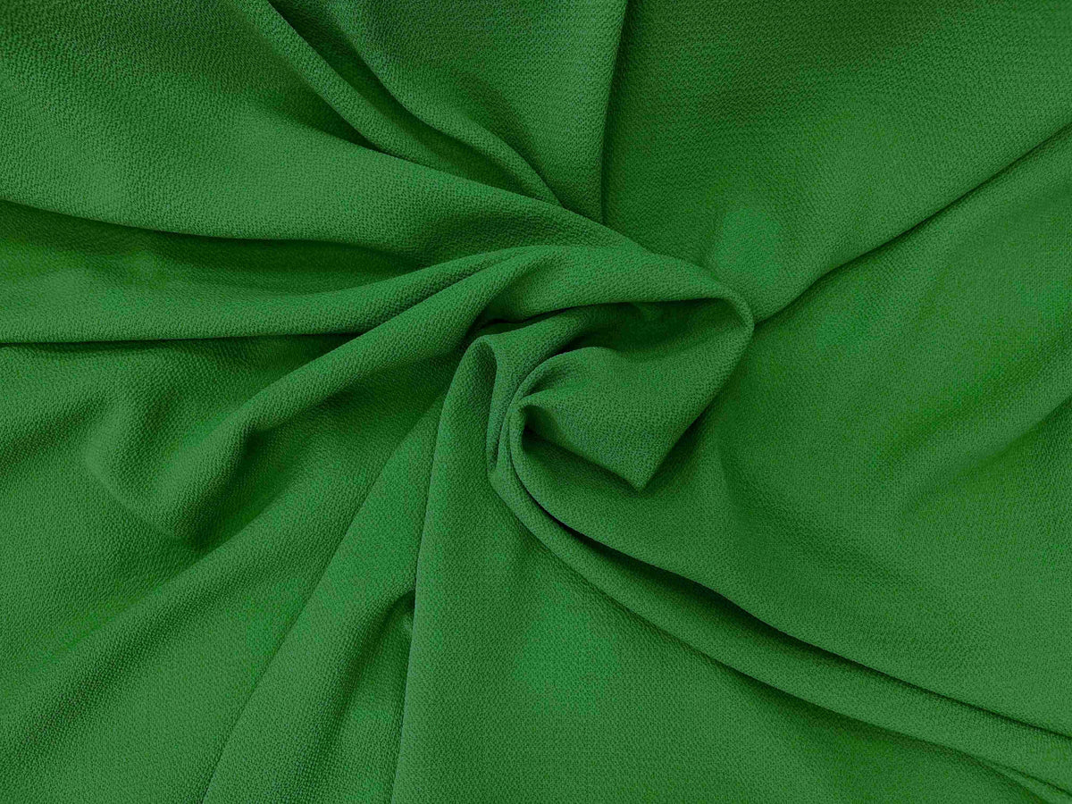 Green plain bubble georgette fabric from Cheap Fabrics, showcasing lightweight, sheer georgette textile with a textured bubble pattern.