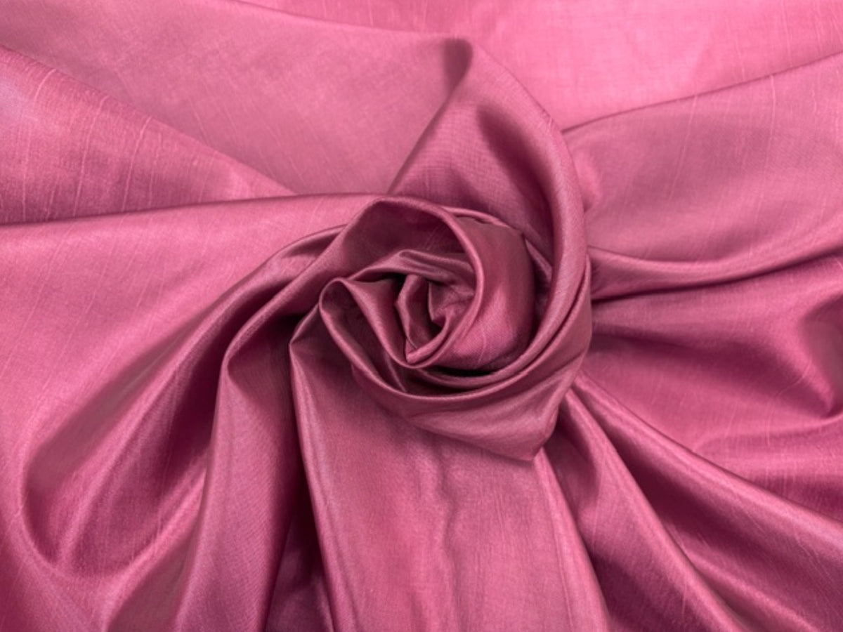 Cherry-colored taffeta fabric from Cheapfabrics, showcasing smooth, shiny taffeta material with a vibrant red hue.