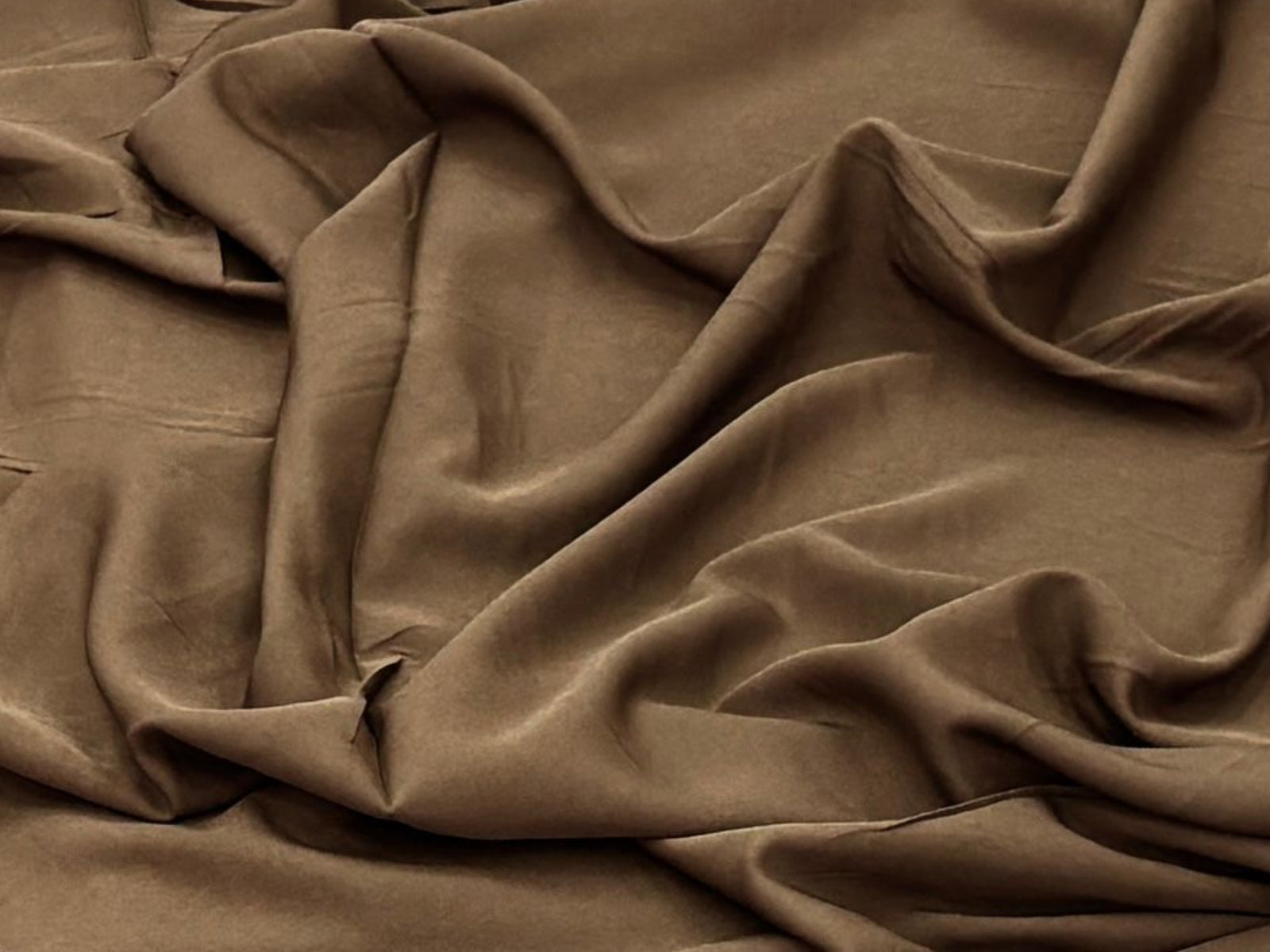 Dusty pink plain matte crepe lining fabric from Cheap Fabrics, showcasing smooth, lightweight lining material for sewing projects.