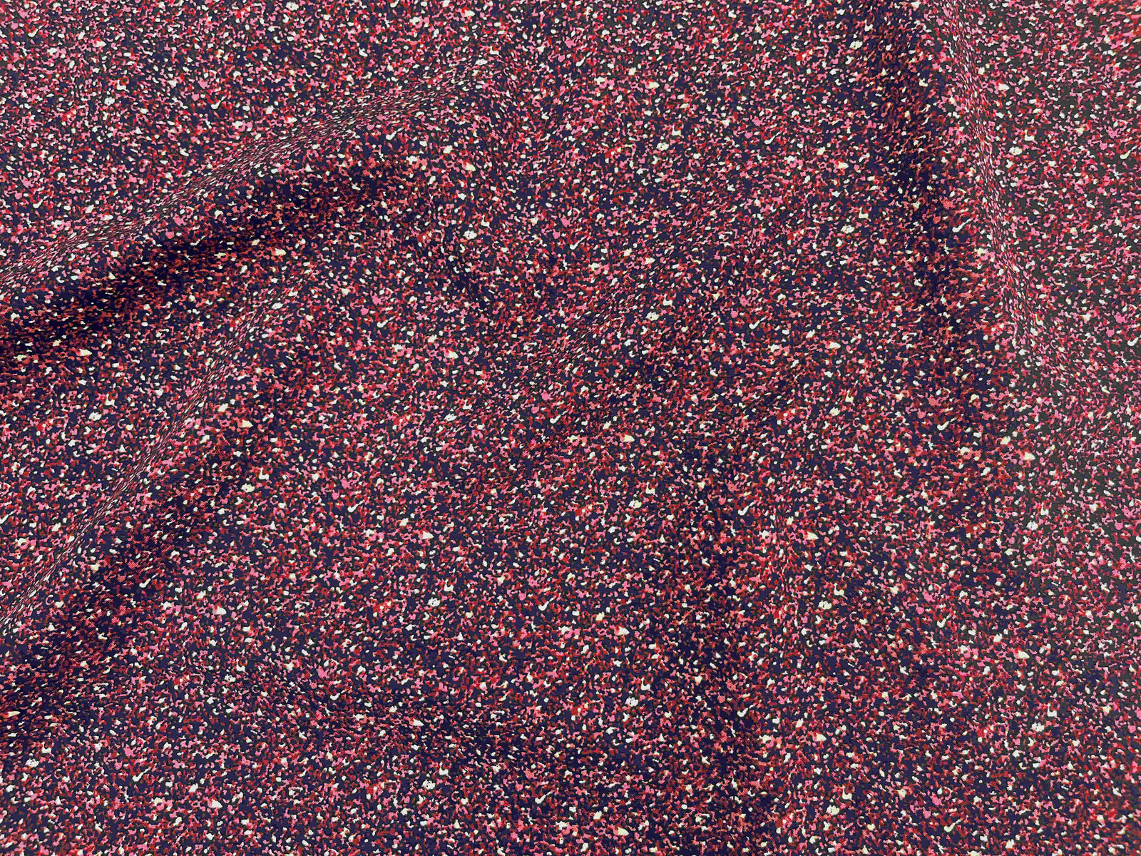 Deluxe printed viscose fabric in granite with violet patterns, showcasing soft, lightweight textile by Cheap Fabrics.