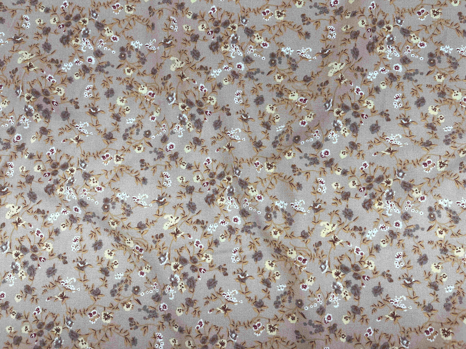 Beige Deluxe Printed Viscose Fabric with micro floral pattern by Cheap Fabrics, showcasing soft, lightweight textile with detailed floral design.