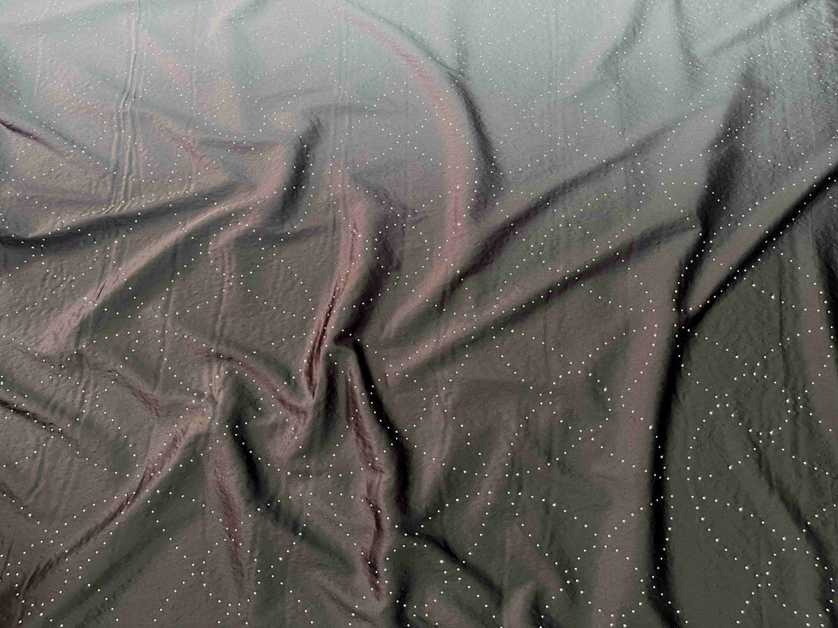 Black and grey Dew Drop Crystal Ombre Satin Fabric by Cheapfabrics showing smooth, shiny satin material with gradient color effect.
