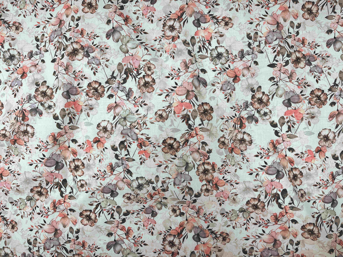 Cream digital printed cotton fabric featuring a floral meadow design, ideal for quilting, dressmaking, and craft projects.