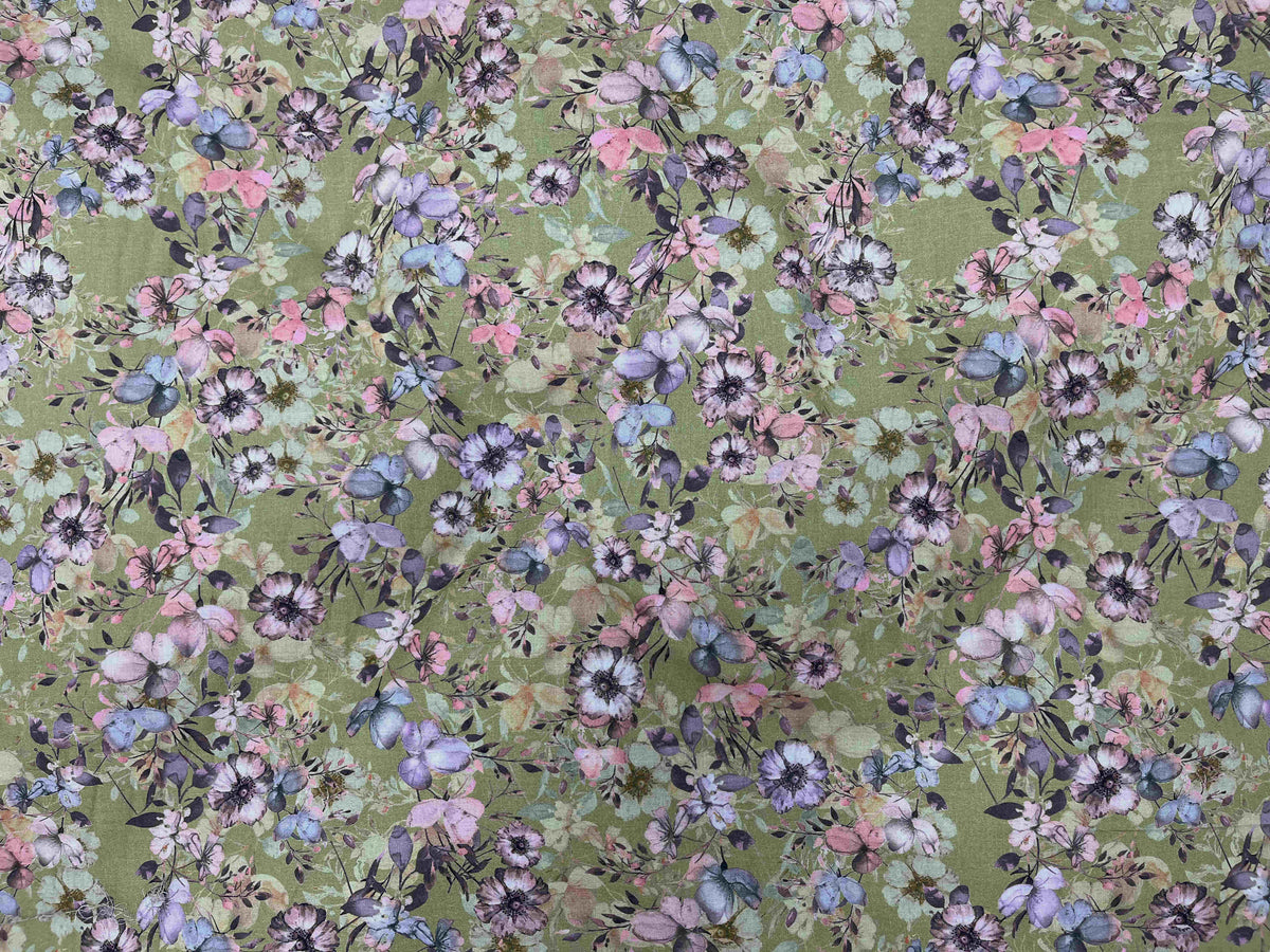 Digital printed cotton fabric with a floral meadow pattern in olive green, perfect for quilting and apparel from Cheapfabrics.