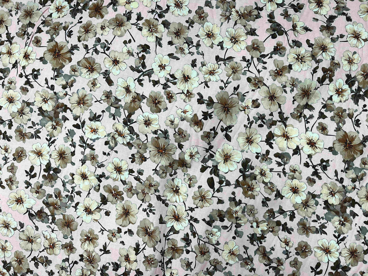 Pink digital printed cotton lawn fabric with blossom pattern, lightweight and soft for sewing and crafting projects.