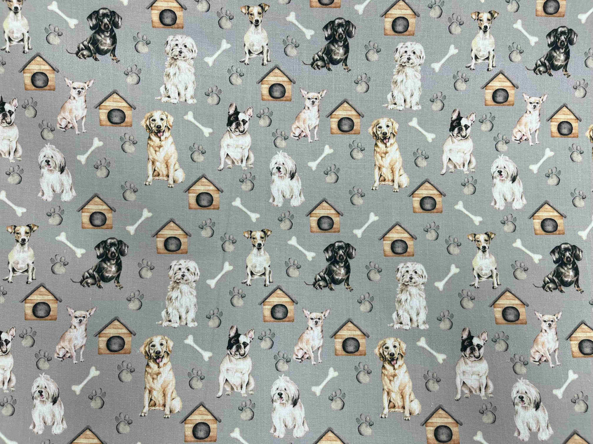 Gray polycotton printed fabric featuring playful dog and bone pattern from Cheap Fabrics. Ideal for sewing projects.