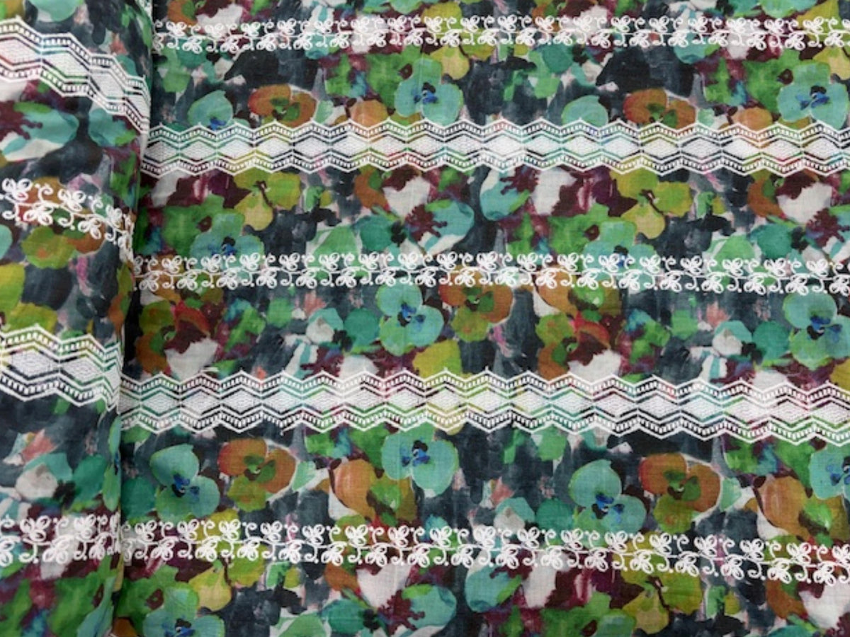Embroidered cotton lawn fabric with multi-floral stripe pattern in green, perfect for dresses and lightweight clothing.