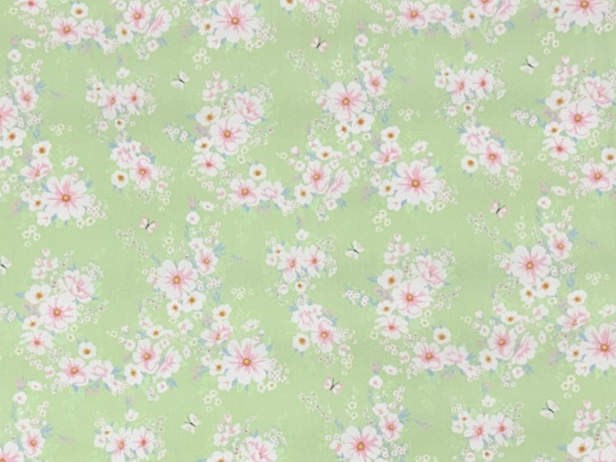 Green floral cluster Bridgerton polycotton fabric from Cheap Fabrics showing a detailed floral pattern on smooth polycotton material.