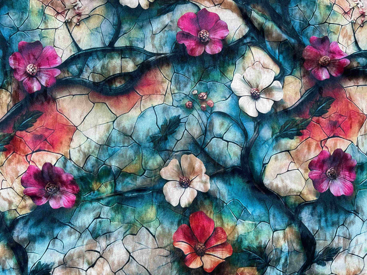 Teal and cerise floral printed stretch velvet fabric by Cheapfabrics, showcasing soft velvet with vibrant floral pattern.
