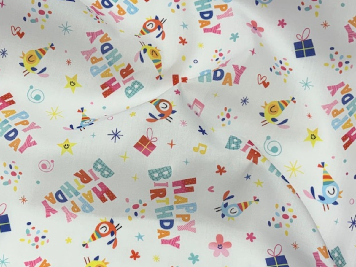 Poly/Cotton fabric with a Happy Birthday print, featuring colorful birthday-themed designs on soft, durable material by Cheap Fabrics