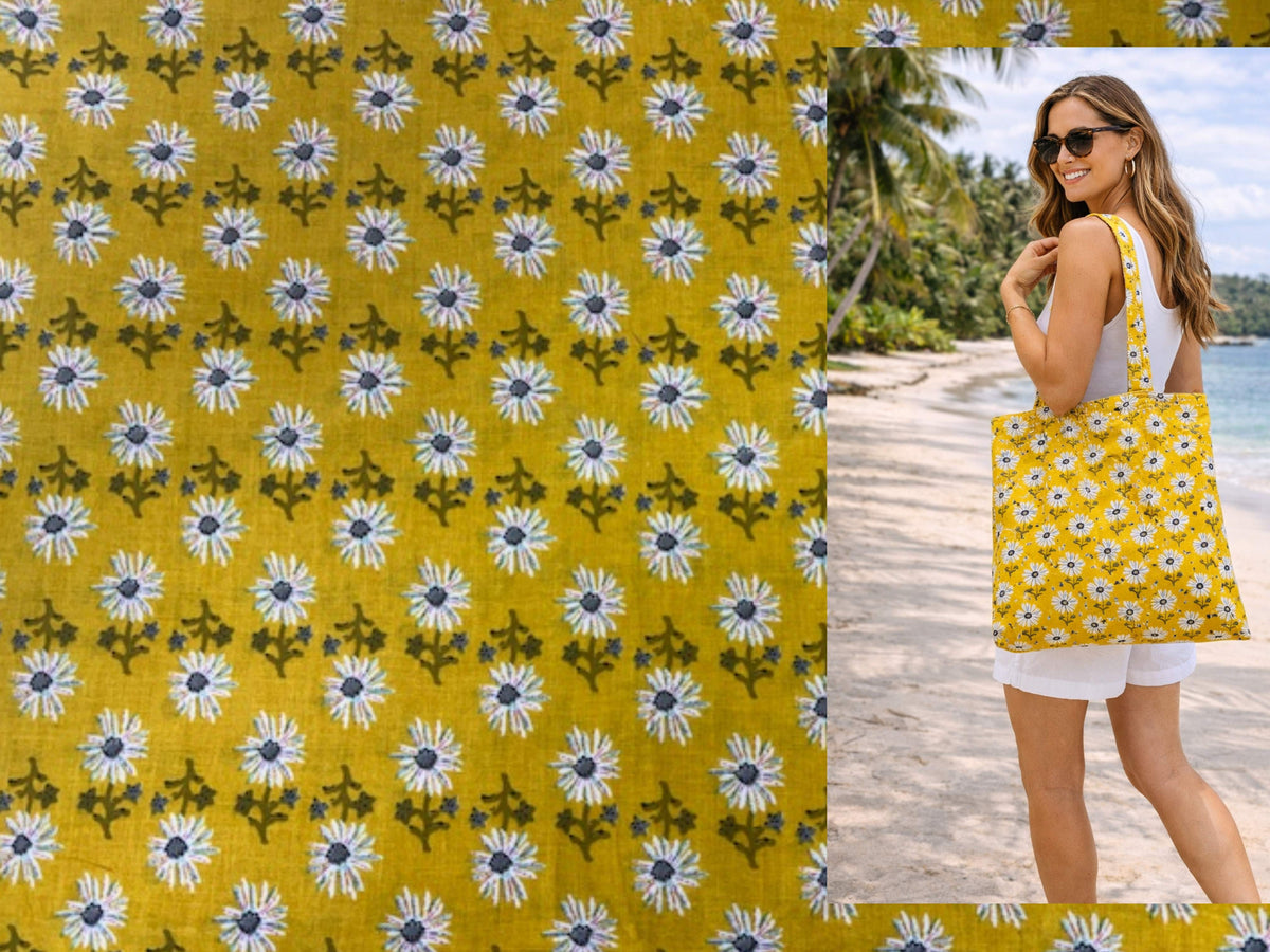 Indian ethnic cotton fabric with mustard floral print, featuring a model carrying a bag, showcasing the vibrant textile design.
