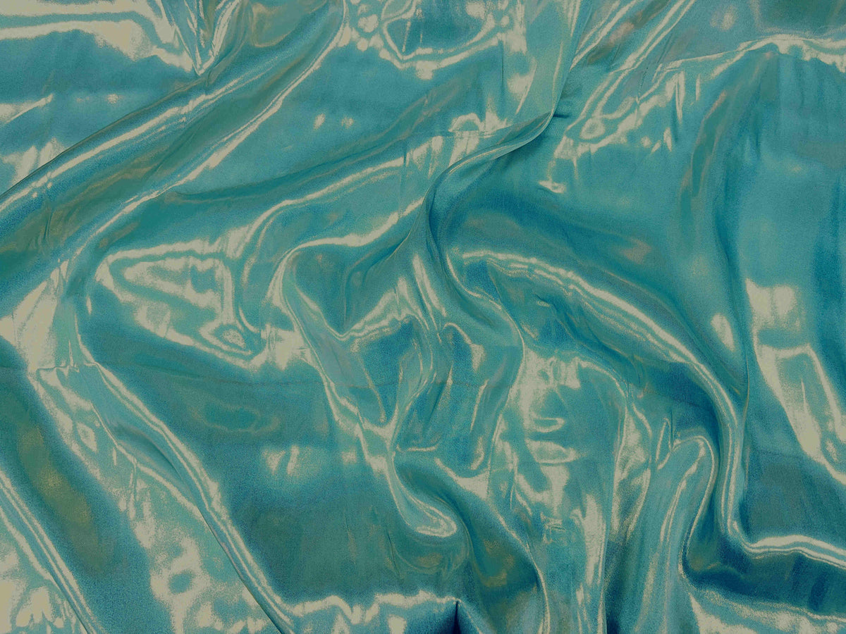Aqua gold metallic foil liquid satin fabric from Cheap Fabrics, showcasing shiny, smooth satin material with a metallic finish.