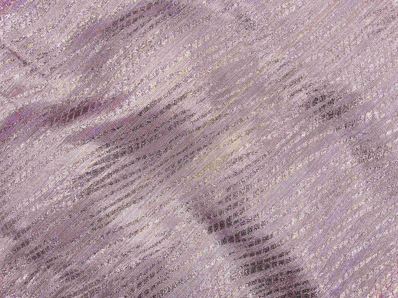Metallic shimmer georgette fabric from Cheap Fabrics, showing a smooth, shiny textile with a metallic finish and flowing texture.