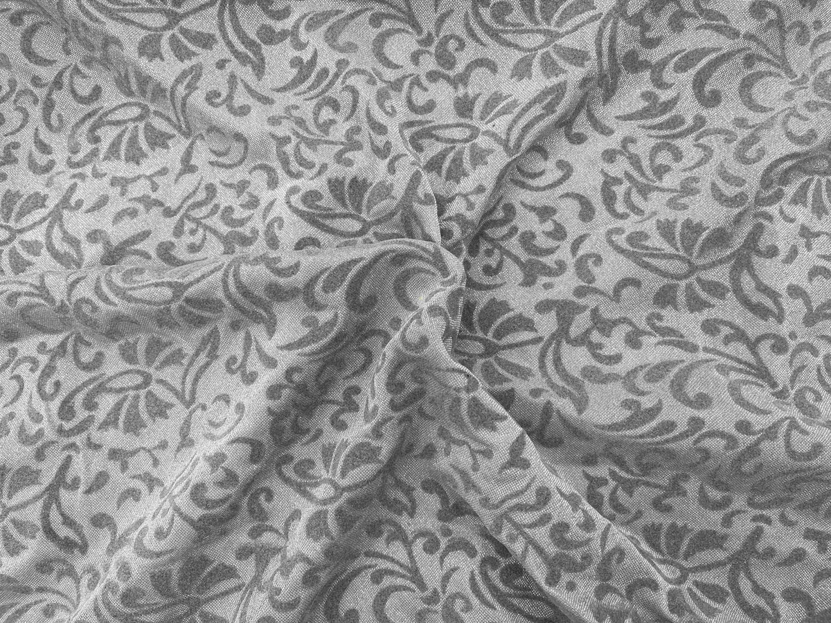 Grey Moonlight Flock Jersey Fabric with a soft texture, ideal for crafting and apparel projects.