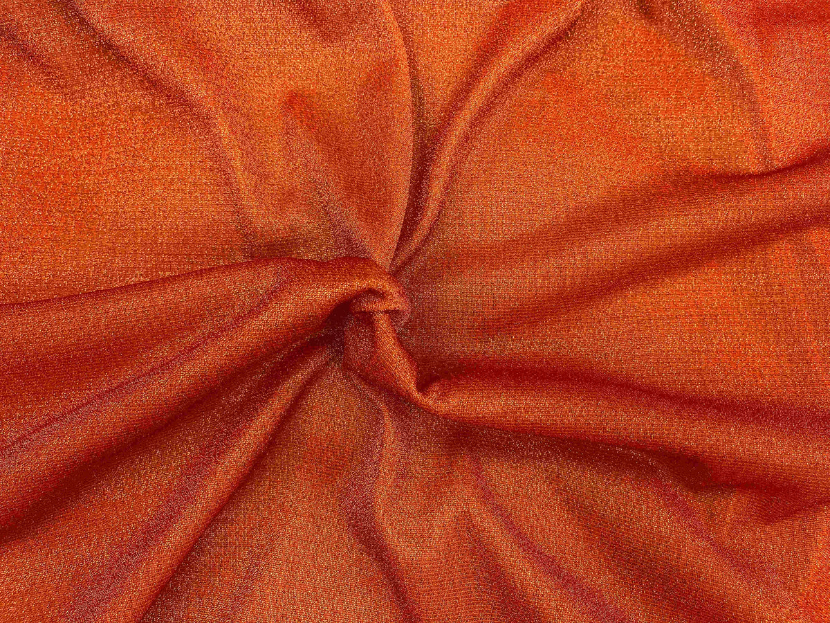 Orange Moonlight Jersey Fabric from Cheapfabrics, showing smooth, plain jersey material ideal for sewing and craft projects.