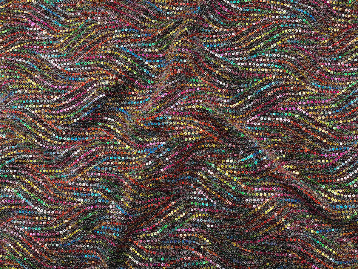 Copper-colored multi sequin jersey knit fabric from Cheap Fabrics, showcasing shiny sequins on soft, stretchable jersey material.