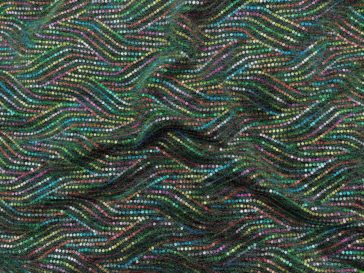 Green multi sequin jersey knit fabric by Cheap Fabrics, showing a close-up of shiny, colorful sequin embellishments on soft jersey material.