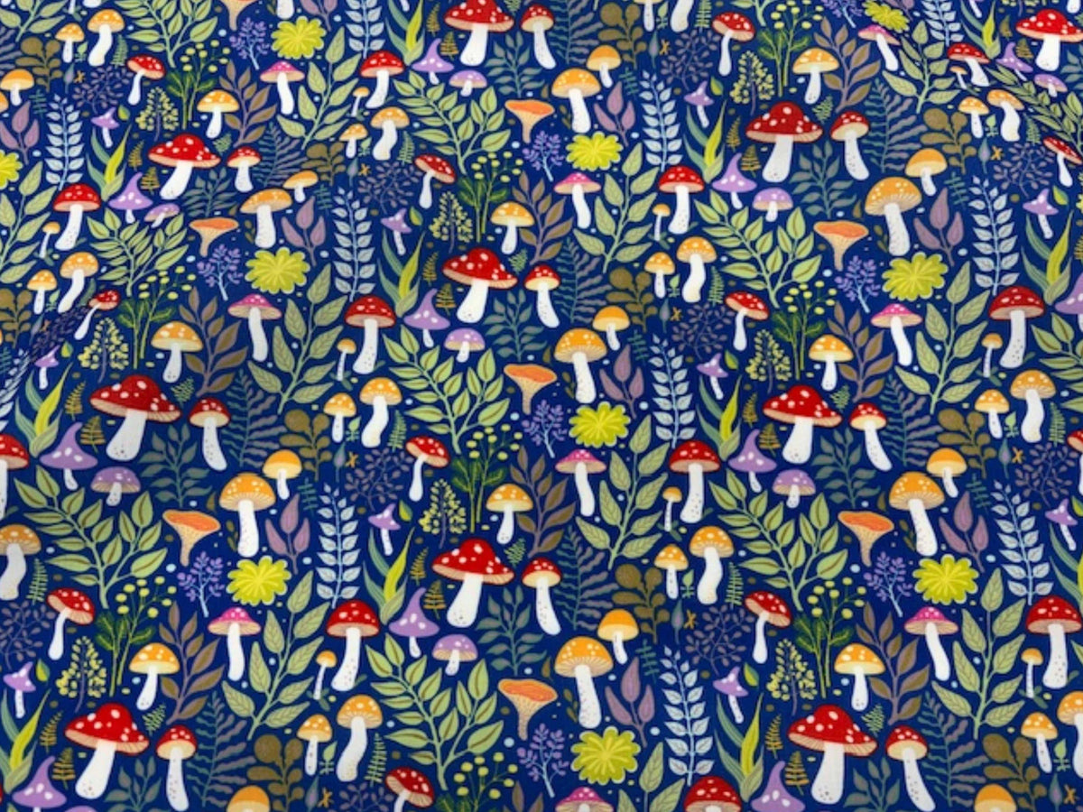 Navy Mushroom Forest Woodland polycotton fabric featuring woodland toadstool pattern, ideal for quilting and craft projects.