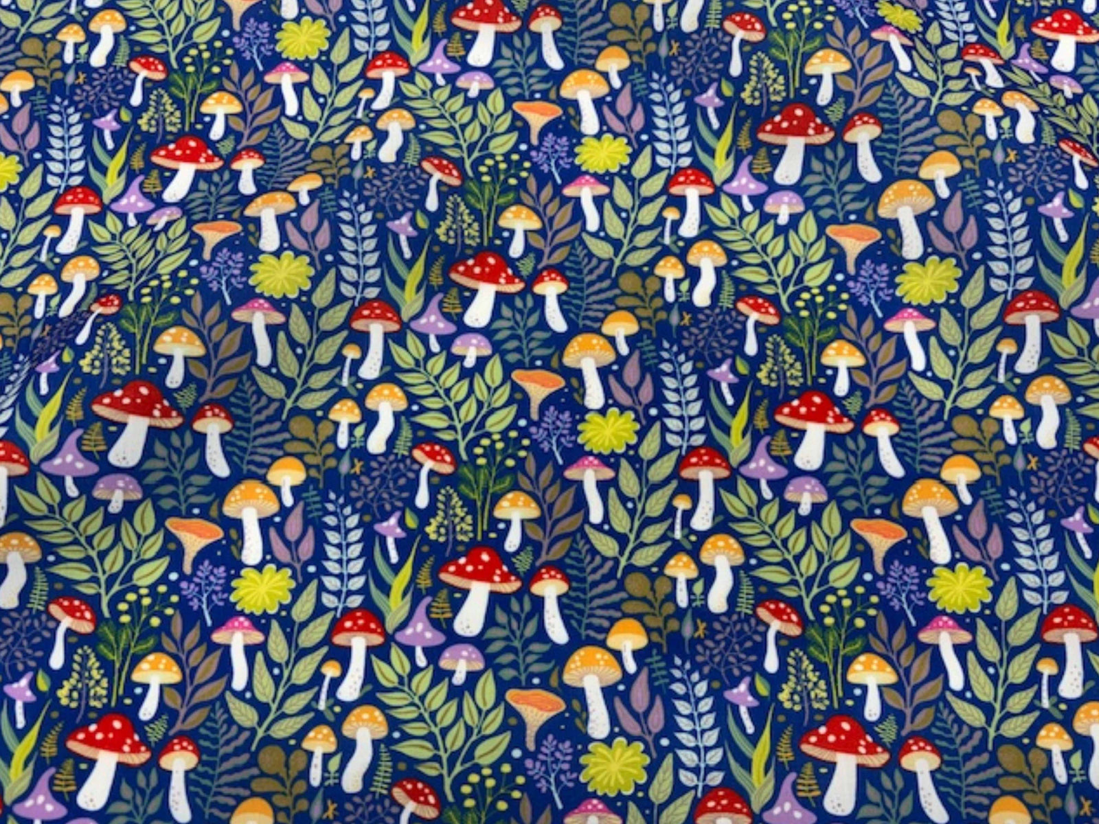 Navy Mushroom Forest Woodland polycotton fabric featuring woodland toadstool pattern, ideal for quilting and craft projects.