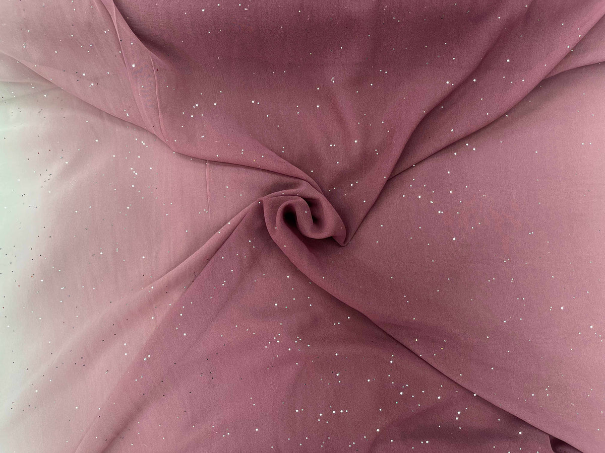 Ombre crystal chiffon fabric in brick color, soft and flowing chiffon material from Cheap Fabrics with shimmering crystal details.