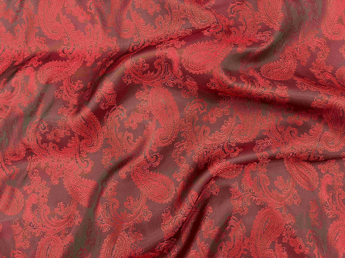 Maroon and black paisley jacquard fabric with self-embossed design, showcasing intricate woven patterns by Cheapfabrics.