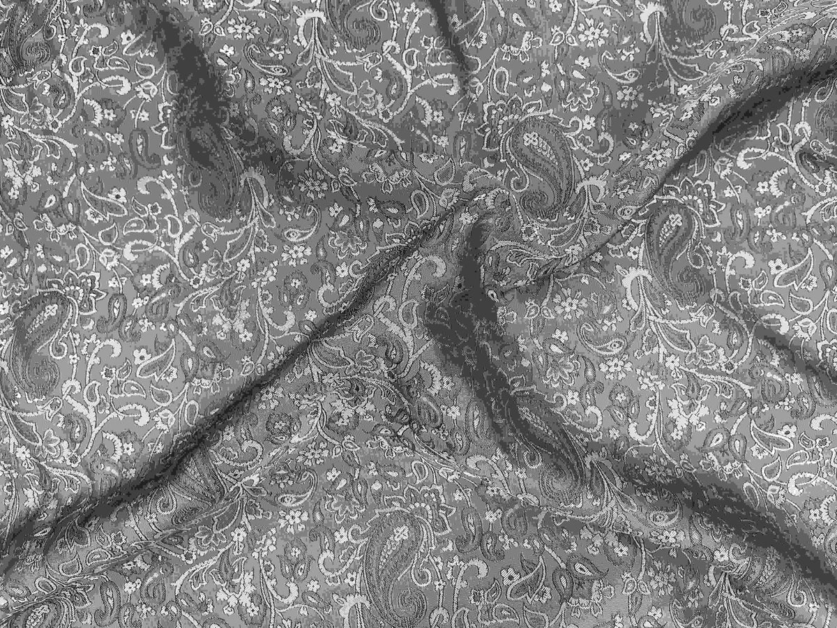 Silver and black paisley jacquard fabric with self-embossed design, featuring intricate pattern details from Cheapfabrics.