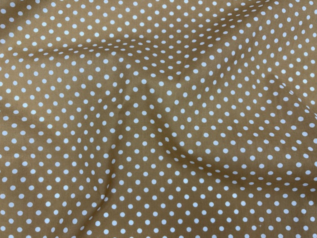 Polka Dots polycotton fabric by Cheap Fabrics featuring a colorful polka dot print on lightweight cotton blend material.