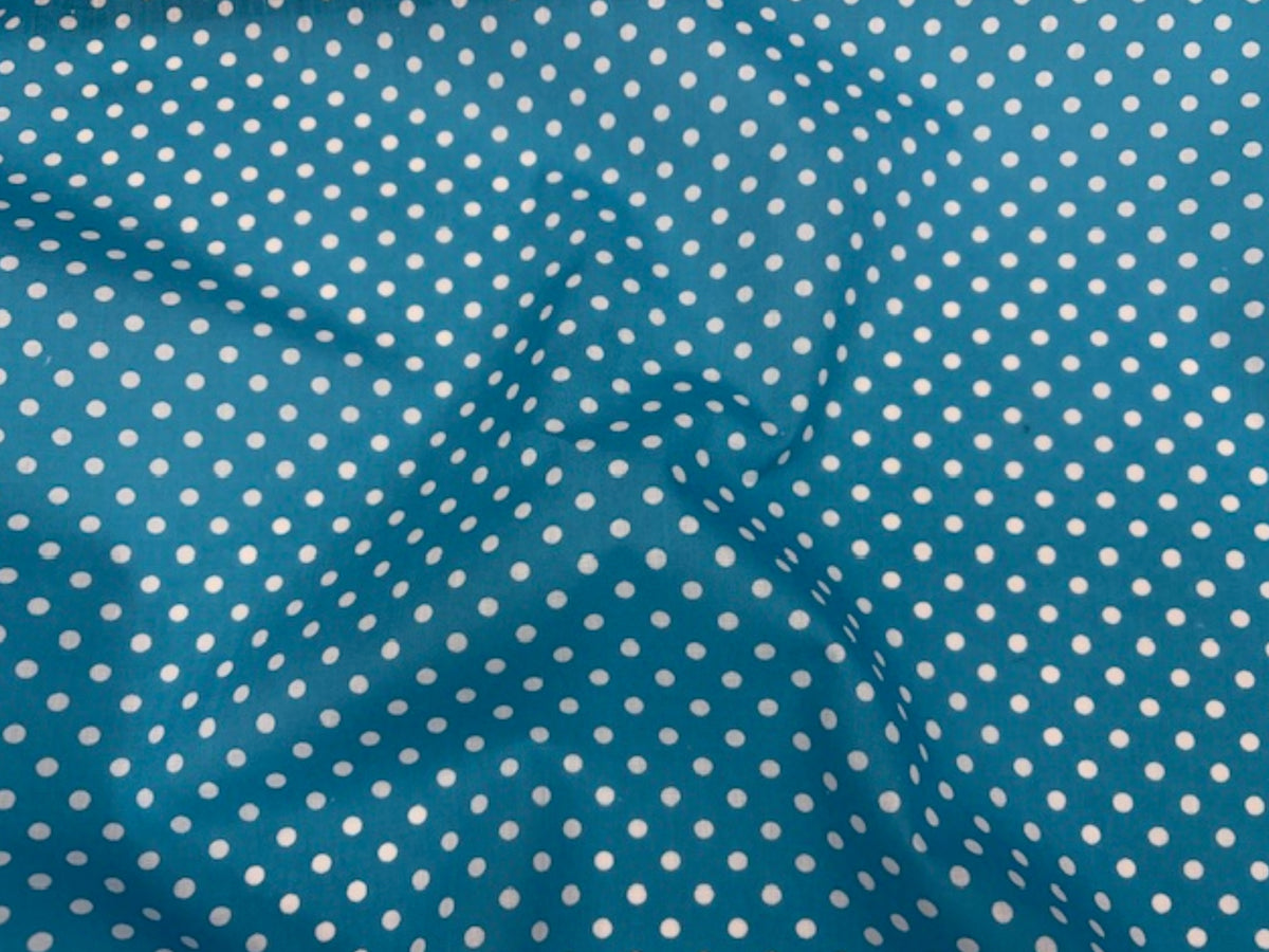 Polka Dots polycotton fabric by Cheap Fabrics featuring a classic black and white polka dot print on soft, breathable material.