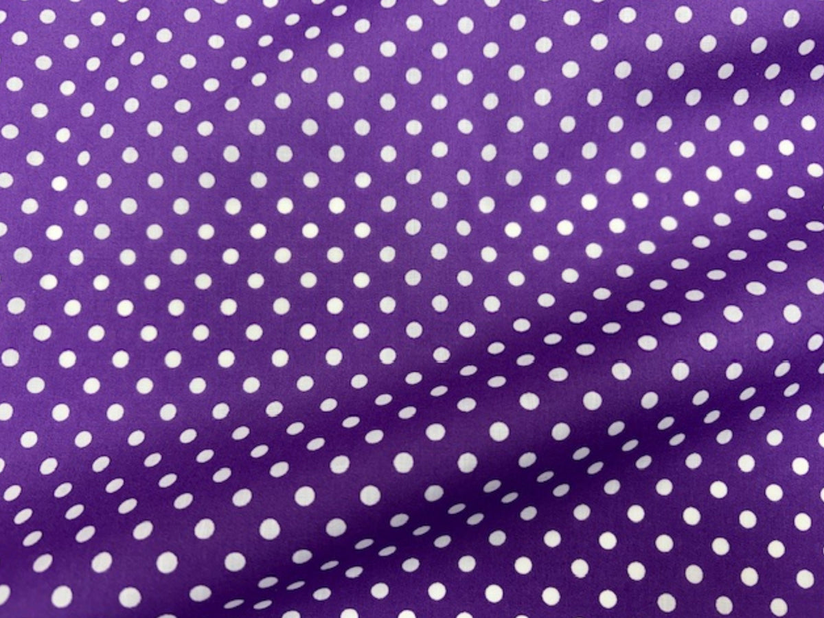 Polka Dots polycotton fabric by Cheap Fabrics featuring a classic black and white polka dot print on soft, breathable material.