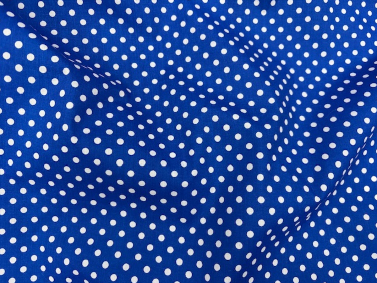 Polka dots polycotton fabric by Cheap Fabrics, featuring a printed polka dot pattern on soft, lightweight poly/cotton material.