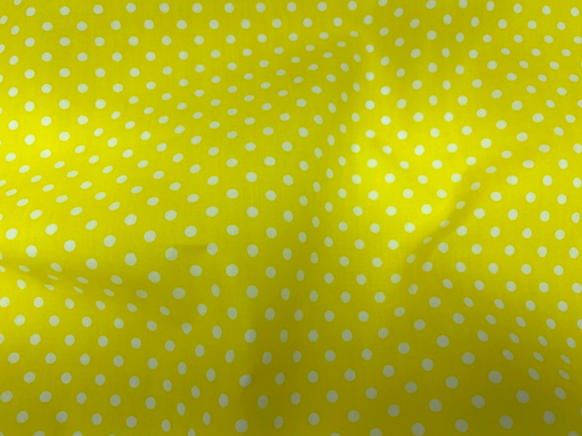 Polka dots polycotton fabric by Cheap Fabrics featuring a playful polka dot print on soft, breathable fabric.