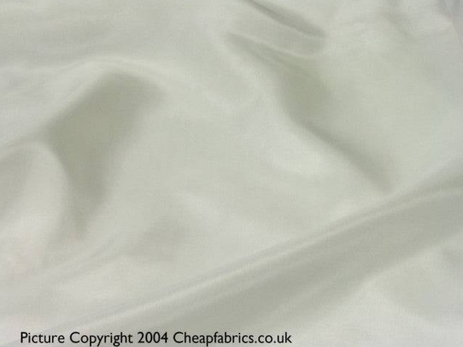 Plain ivory Silk Habotai fabric by Cheapfabrics, smooth and lightweight silk material for sewing and craft projects.