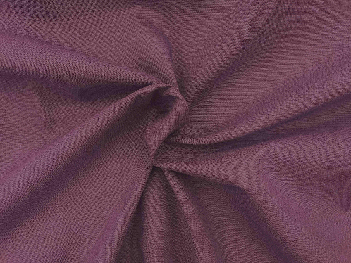 Plain faux linen fabric in aubergine color by Cheap Fabrics, showcasing smooth texture and versatile linen material for upholstery or craft projects.