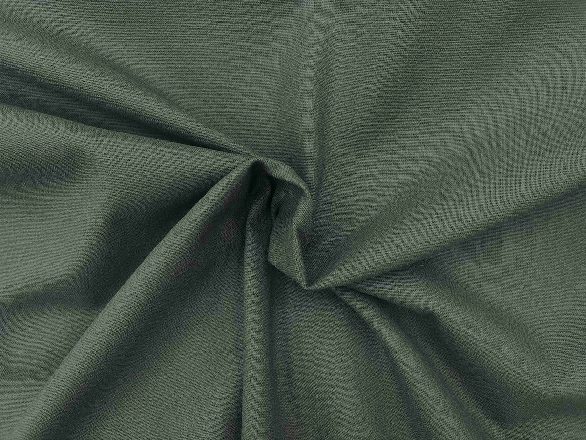 Plain faux linen fabric in bottle green, showcasing smooth texture and fabric weave from Cheap Fabrics.