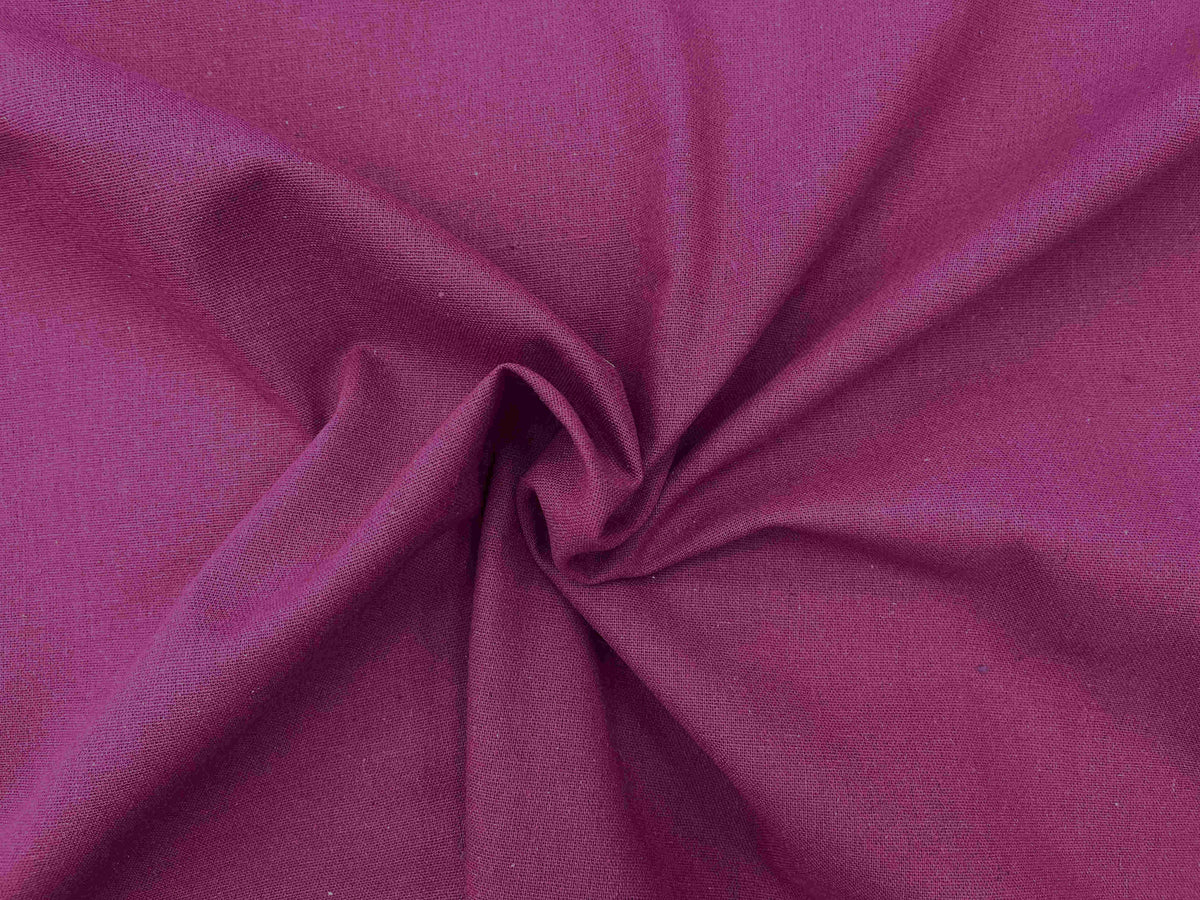 Soft fuchsia plain faux linen fabric from Cheap Fabrics, showcasing smooth texture and vibrant color suitable for upholstery and crafts.