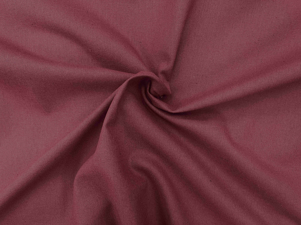 Maroon plain faux linen fabric from Cheap Fabrics, showcasing smooth texture and versatile upholstery or craft material.