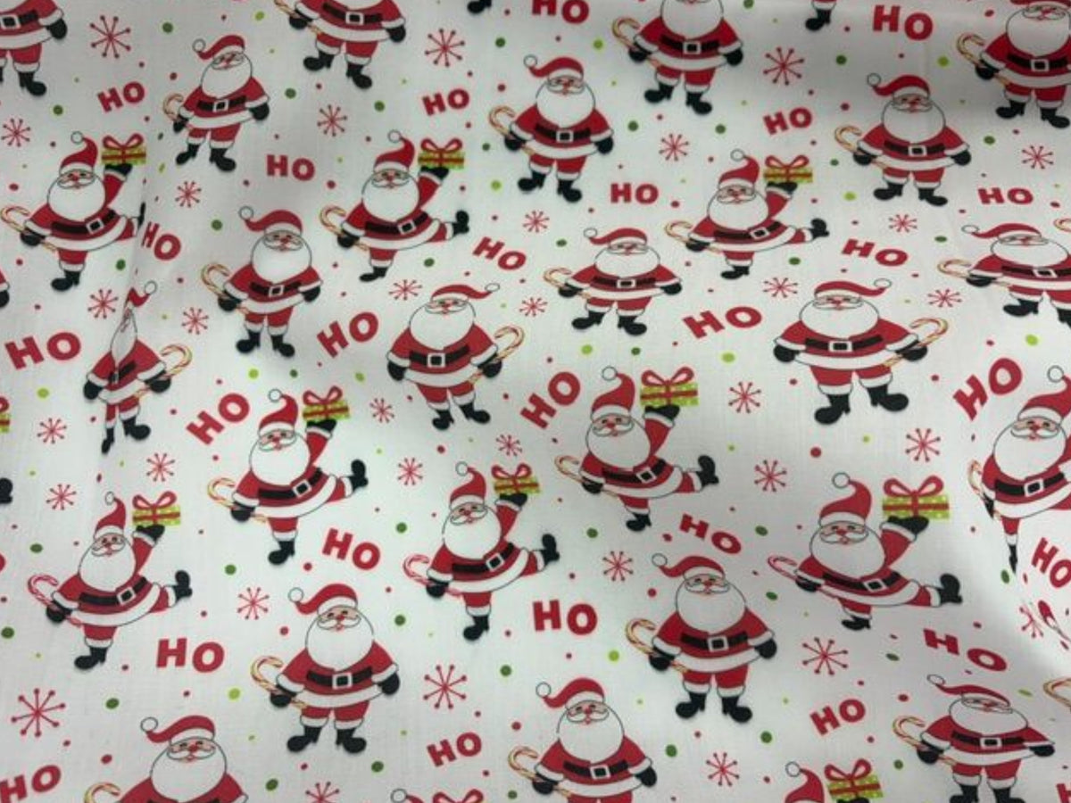 Christmas Santa's Ho-Ho script polycotton fabric print by Cheap Fabrics