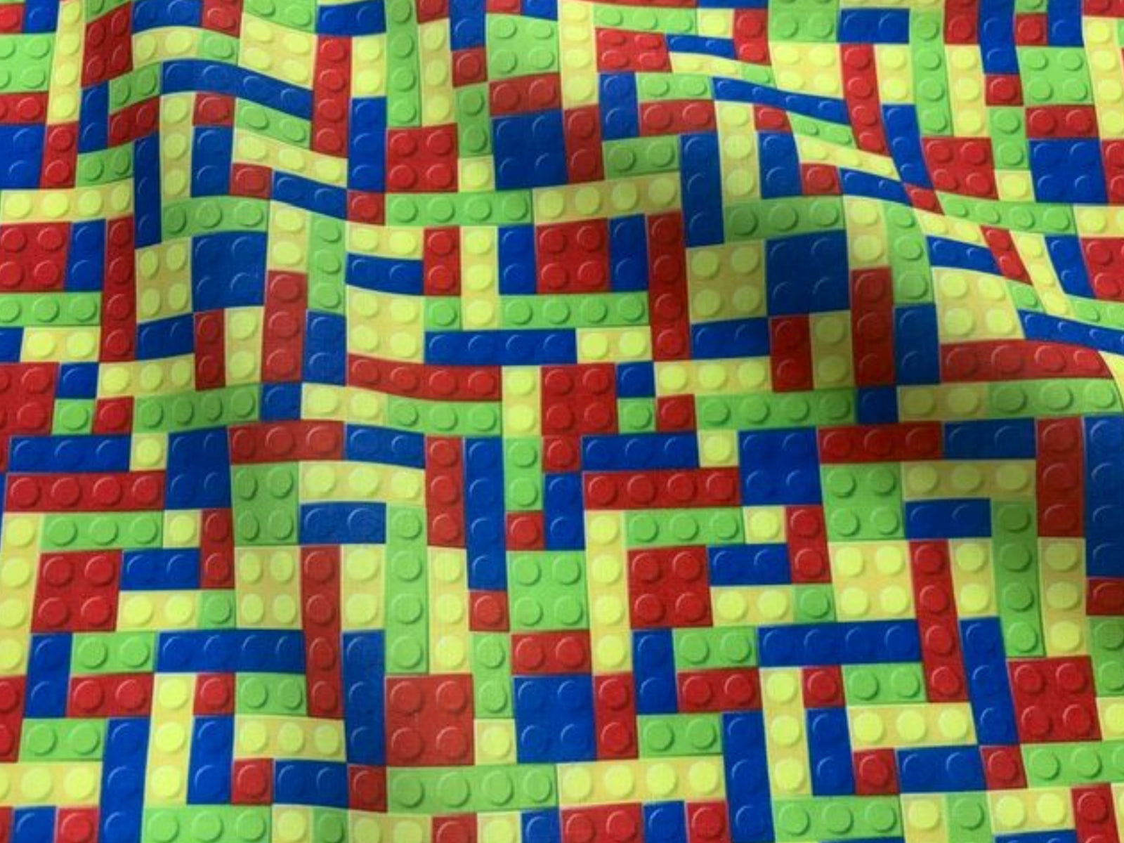 Lego polycotton print fabric by Cheap Fabrics, featuring colorful building block designs