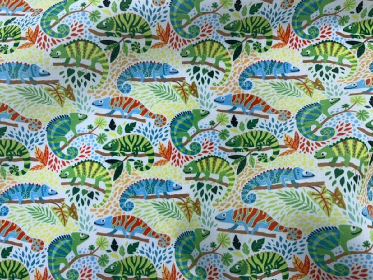 Green reptile print polycotton fabric by Cheap Fabrics