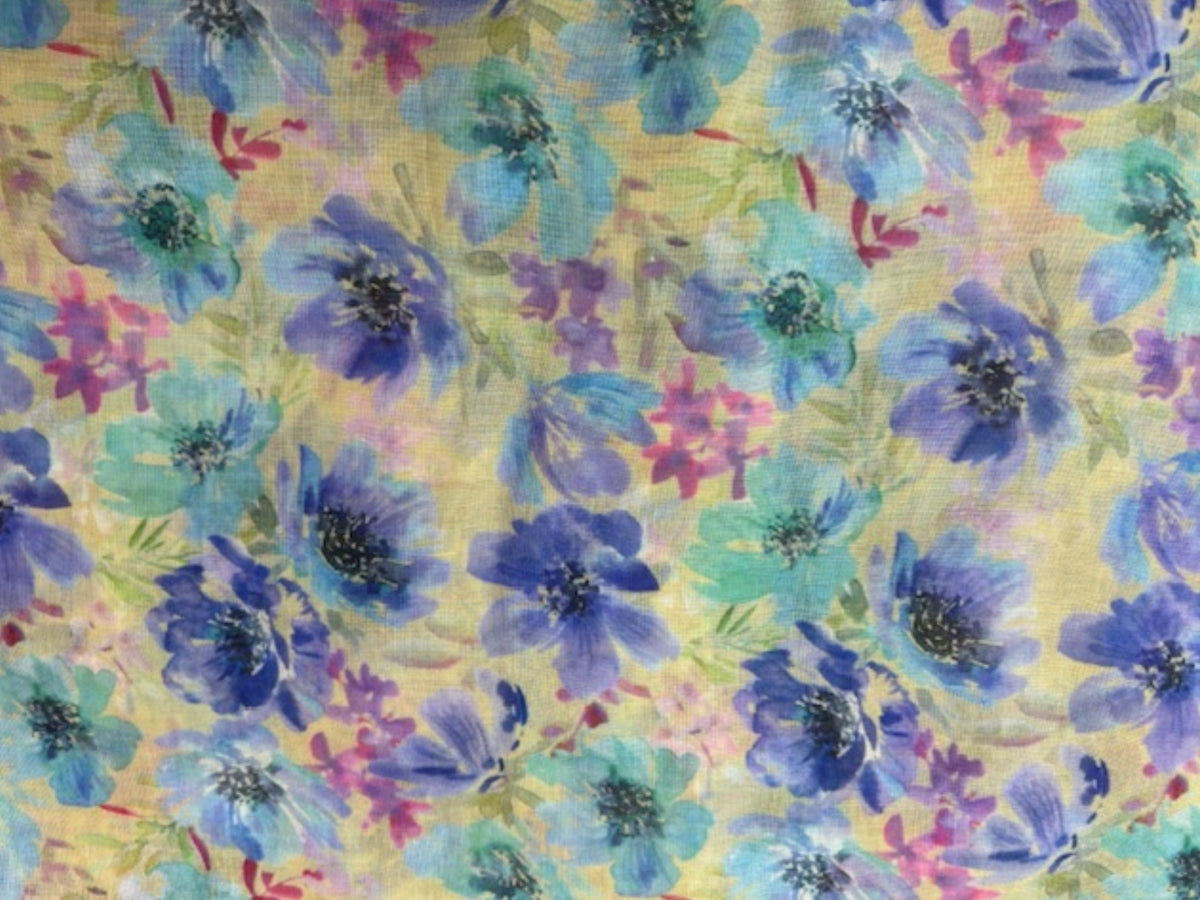 Watercolour floral printed voile fabric from Cheapfabrics, featuring vibrant watercolor floral designs on lightweight voile.