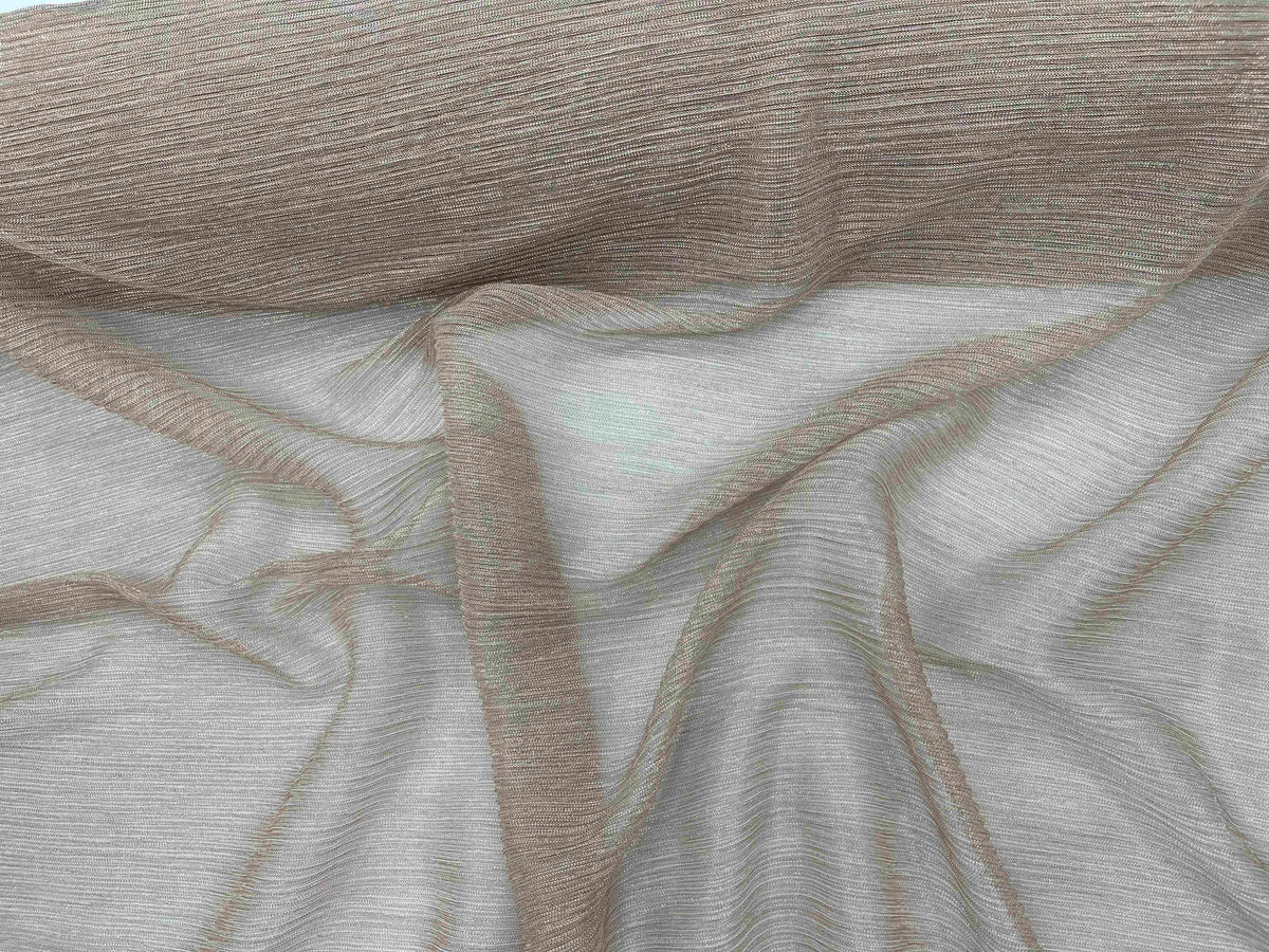 Rose gold ribbed metal chiffon knit fabric by Cheap Fabrics showing a shimmering, lightweight, textured chiffon material.