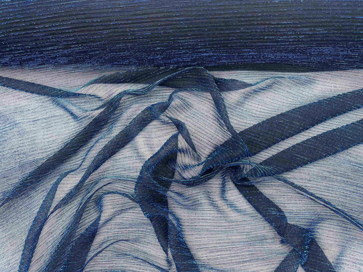 Royal blue ribbed metal chiffon knit fabric by Cheap Fabrics, showcasing its lightweight, textured chiffon material with metallic sheen.