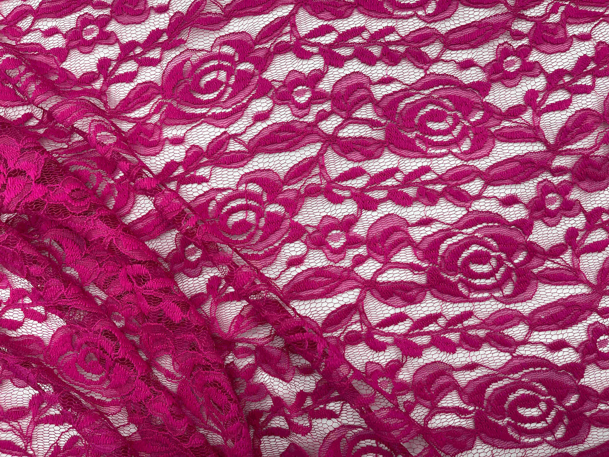 Fuchsia rose lace fabric by Cheapfabrics, featuring intricate floral lace pattern in vibrant pink color.