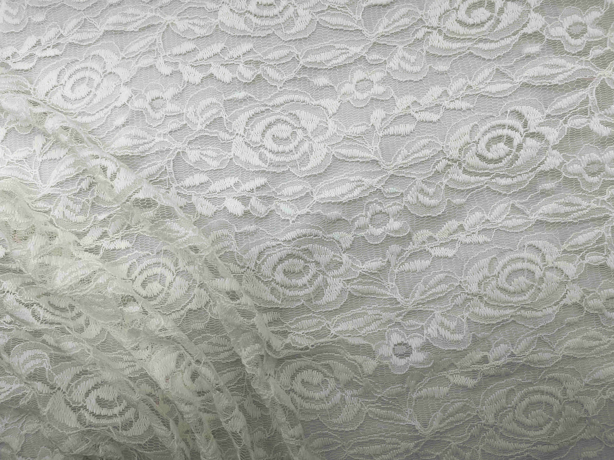 Ivory rose lace fabric from Cheapfabrics featuring intricate floral lace design suitable for dressmaking and crafts.