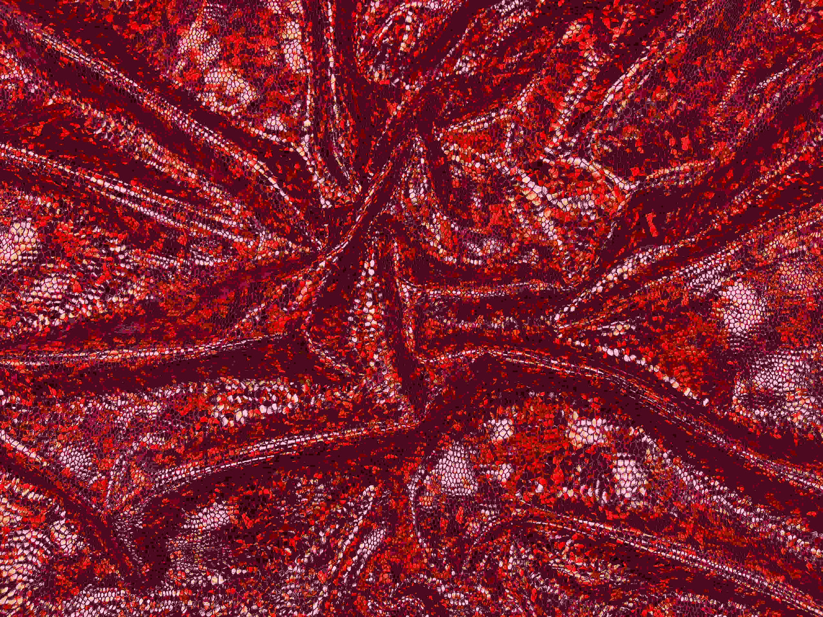 Green snakeskin hologram jersey fabric from Cheapfabrics, showcasing shiny, textured snakeskin pattern on stretchy material.
