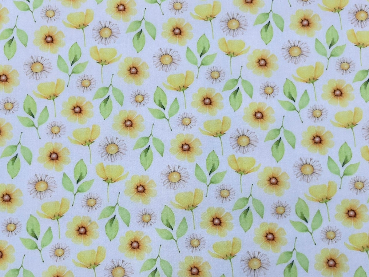 Ivory polycotton fabric with summer daisies pattern, perfect for sewing projects from Cheap Fabrics.