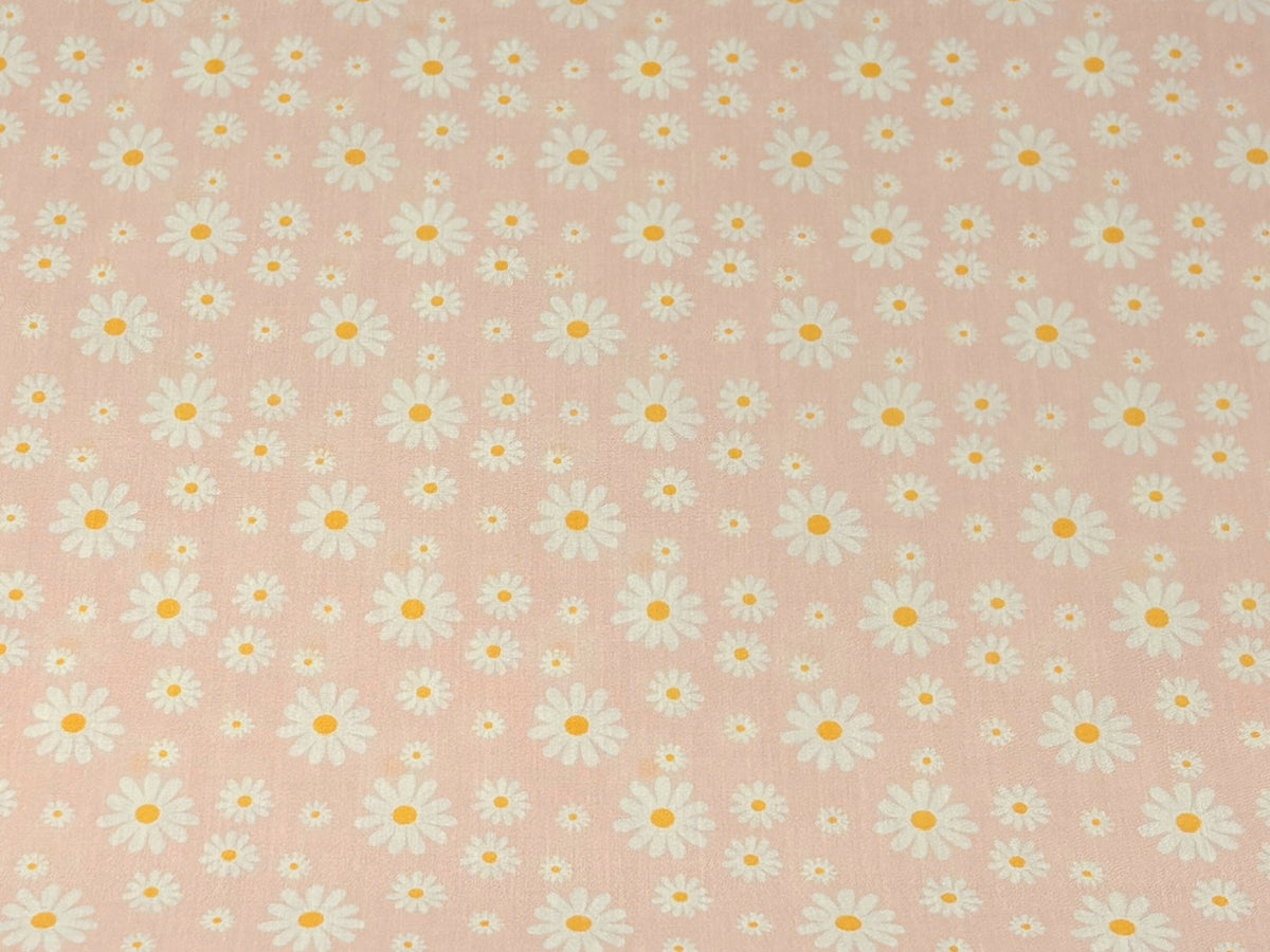 Pink Sunshine Daisies polycotton fabric by Cheap Fabrics with a cheerful daisy floral pattern.